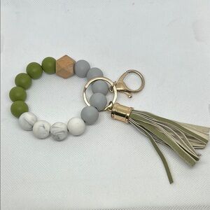 Elegant Green and Gray Beaded Keychain with Tassel